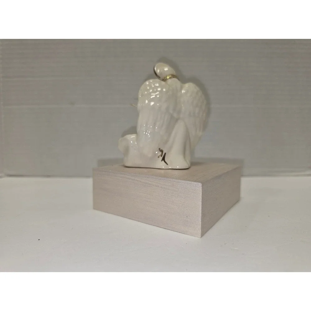 vintage‎ white porcelain angel figurine with gold accents signed